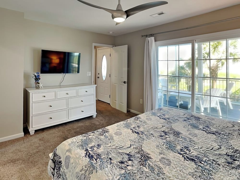 Blue Me A Wave by Topsail Realty