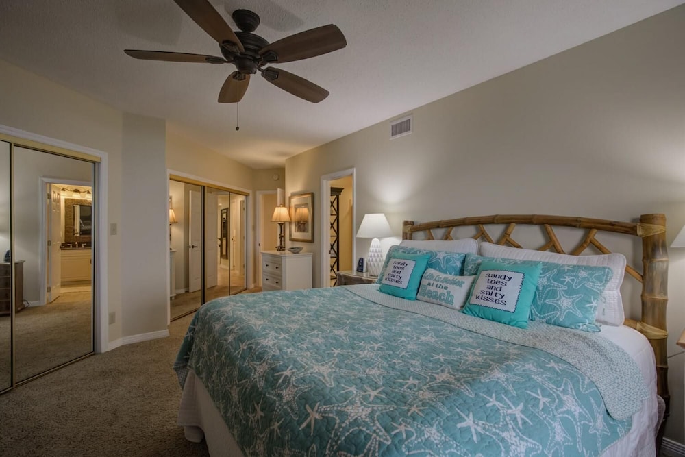 Stunning Ground Floor Condo With Lush Lawn Overlooking White Sands view 3