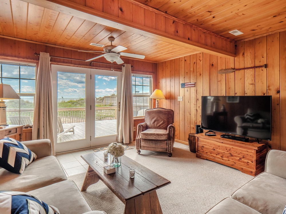 A Charm of Finches by Topsail Realty