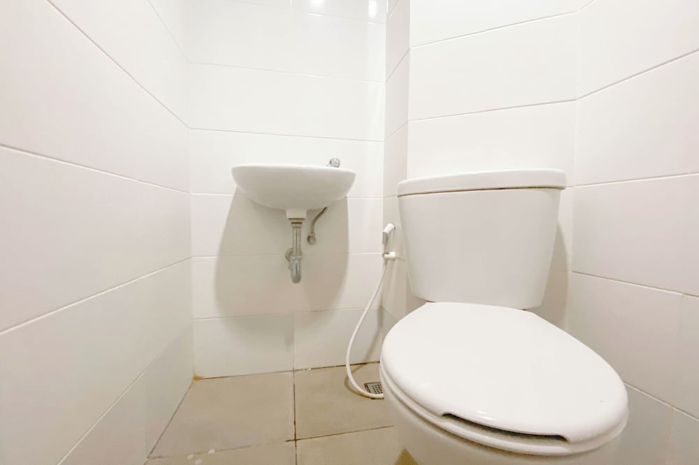 Simple White Studio Apartment At The Alton Semarang