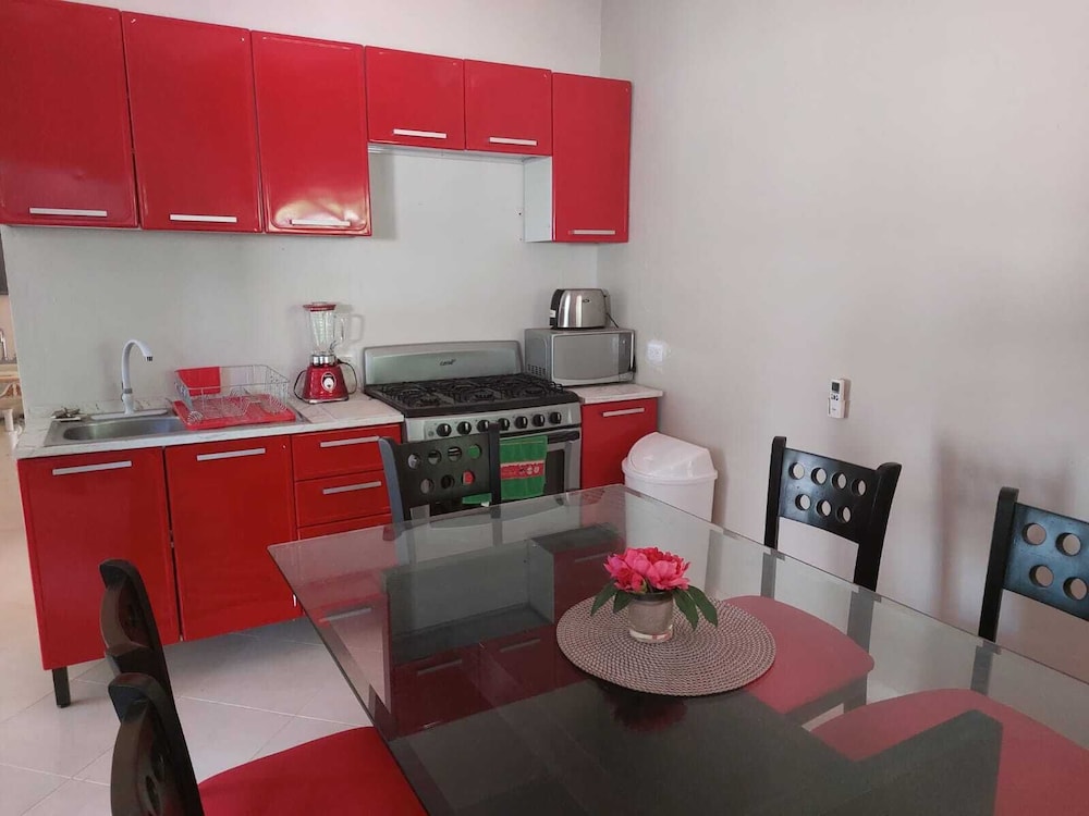 Room in Apartment - Cozy Mérida Retreat With Pool & Garden View