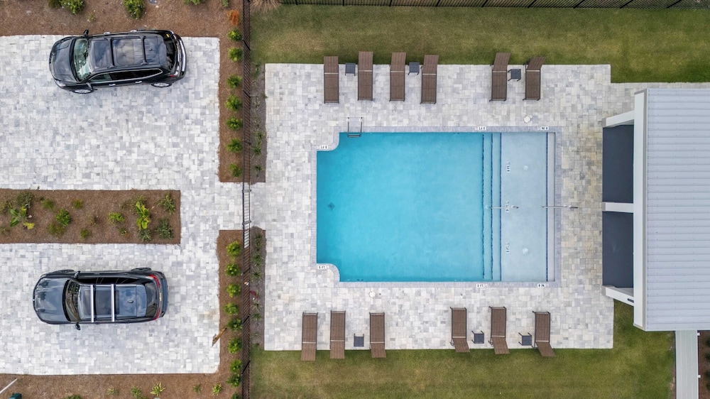 Rooftop Deck w/ Ocean View, Pool, Walk to Beach! Coastal Canopy by Avantstay