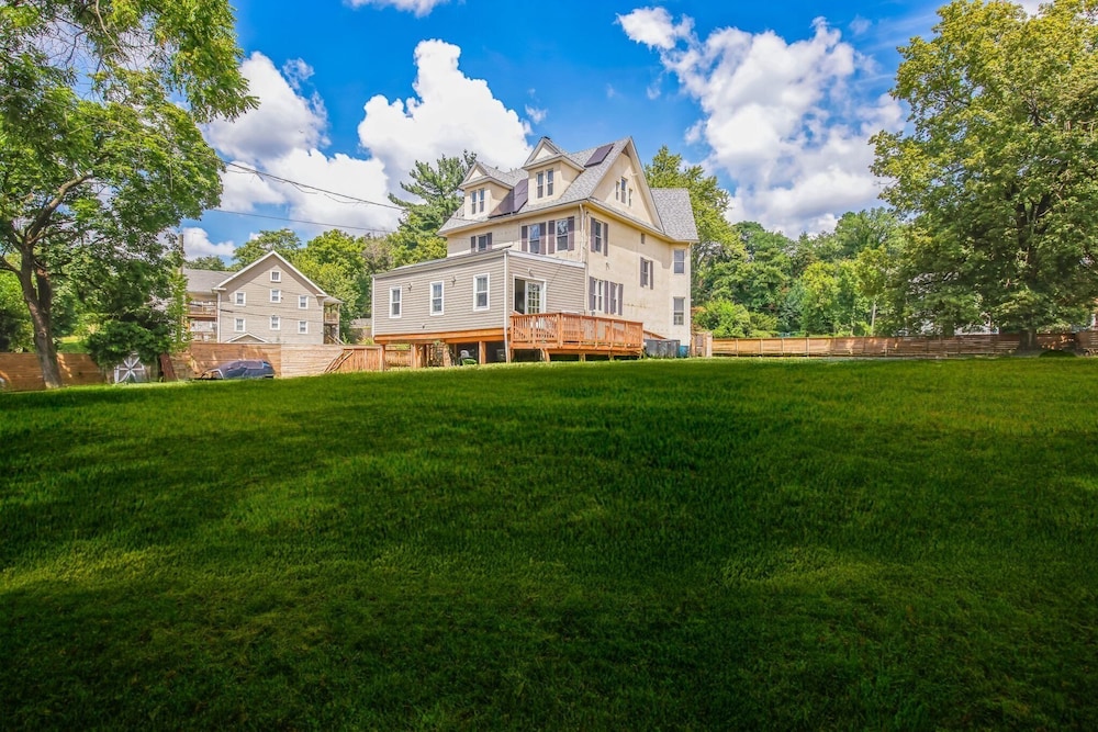 Charming Victorian Home With Porch & Large Yard 7 Bedroom Home