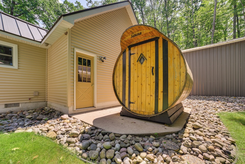 Dock Access + Nearby Beach: Higgins Lake Retreat!
