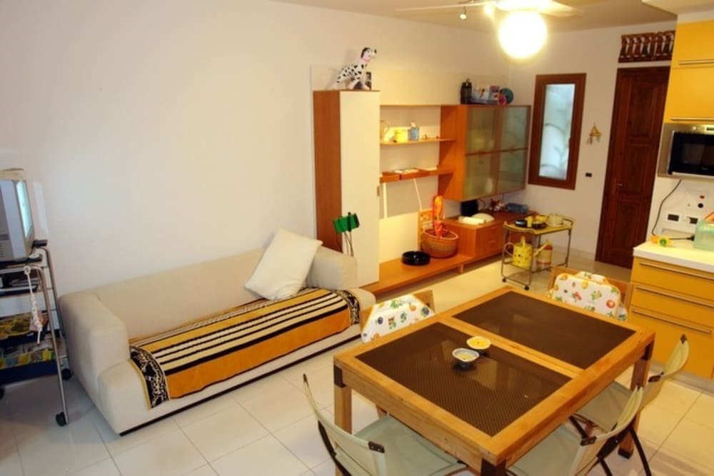 Excellently Equipped row House With Fenced Garden for 8 in Lignano Pineta