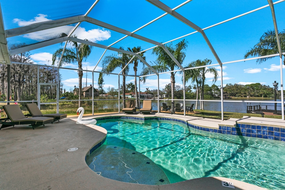 Luxe Waterfront Hideaway w Pool & Pirate Ship Dock
