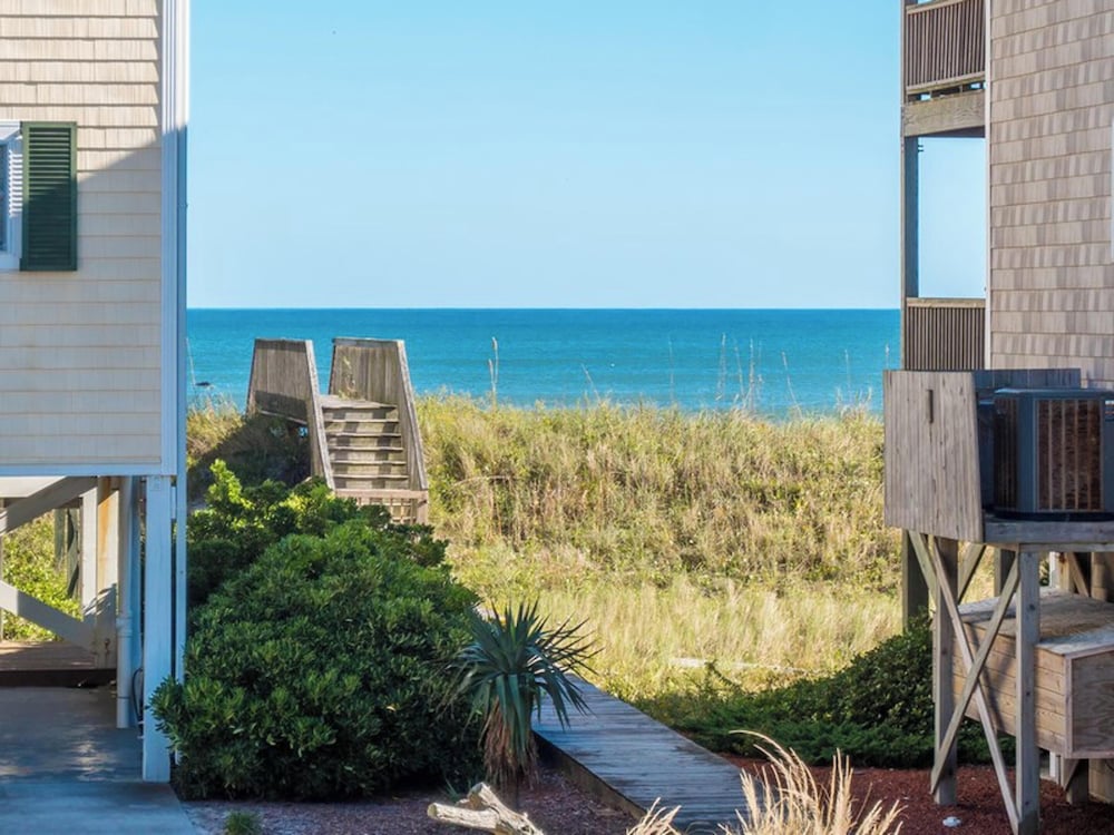 Song Of The Sea by Topsail Realty