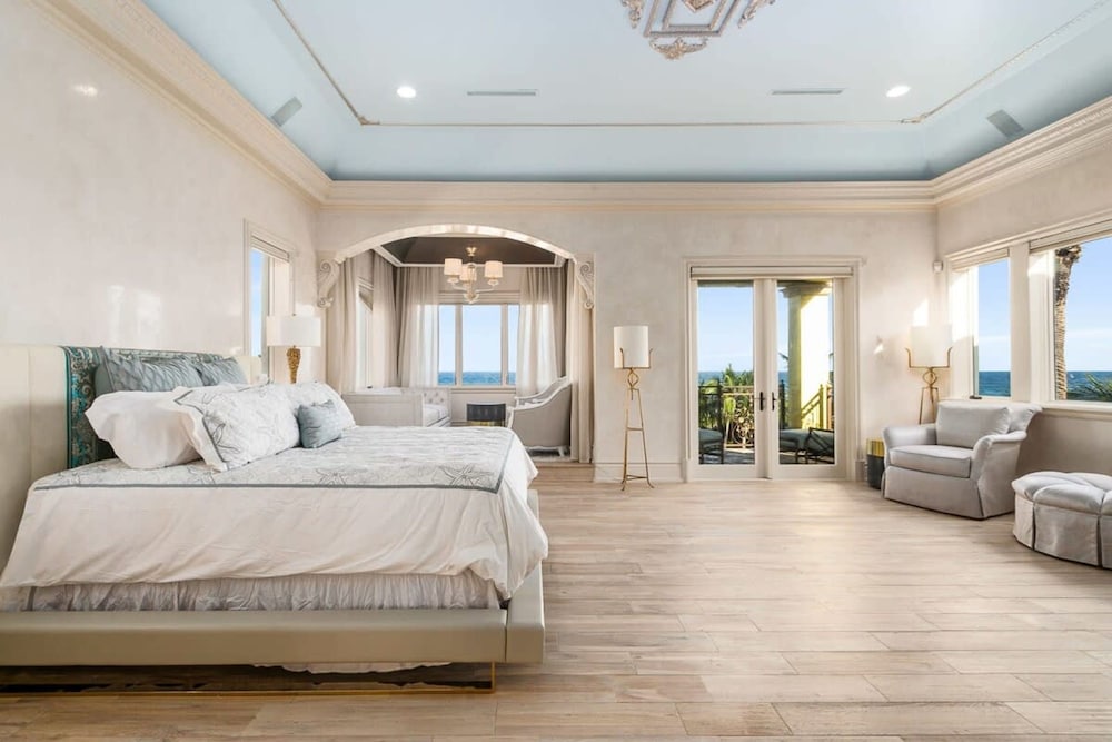 Luxurious 3-story Estate With Gym Pool Slide Private Beach and Lighthouse Views