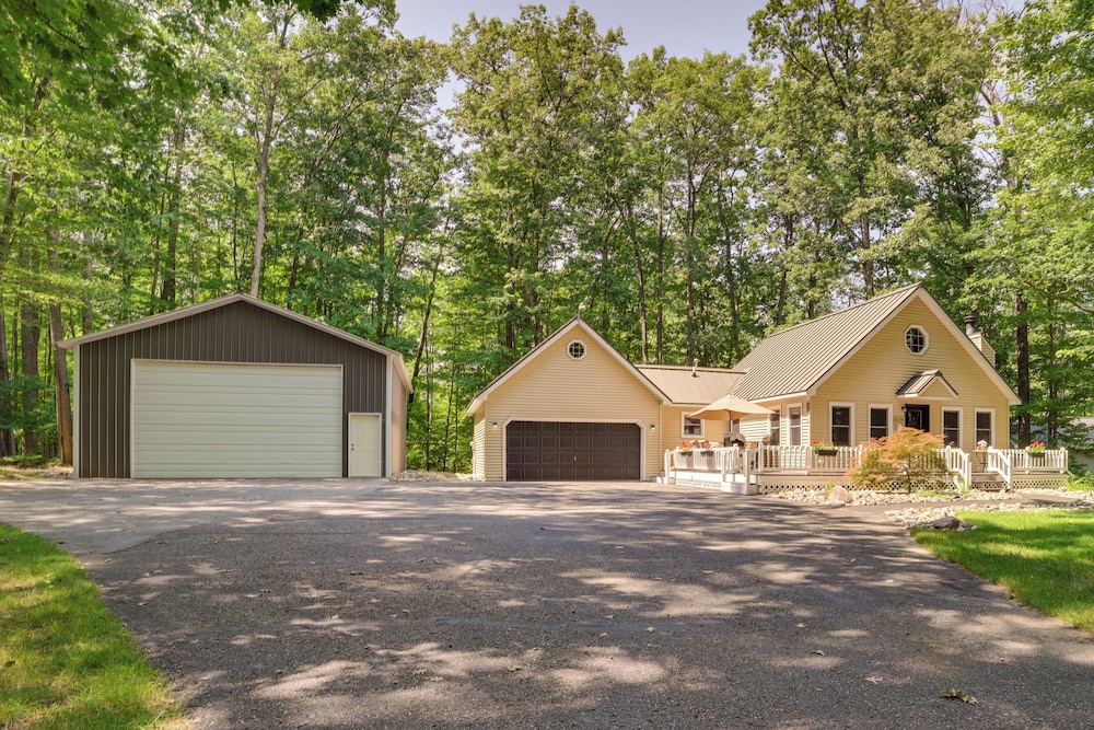 Dock Access + Nearby Beach: Higgins Lake Retreat!