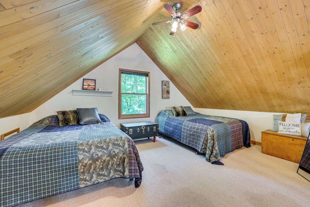 Dock Access + Nearby Beach: Higgins Lake Retreat!