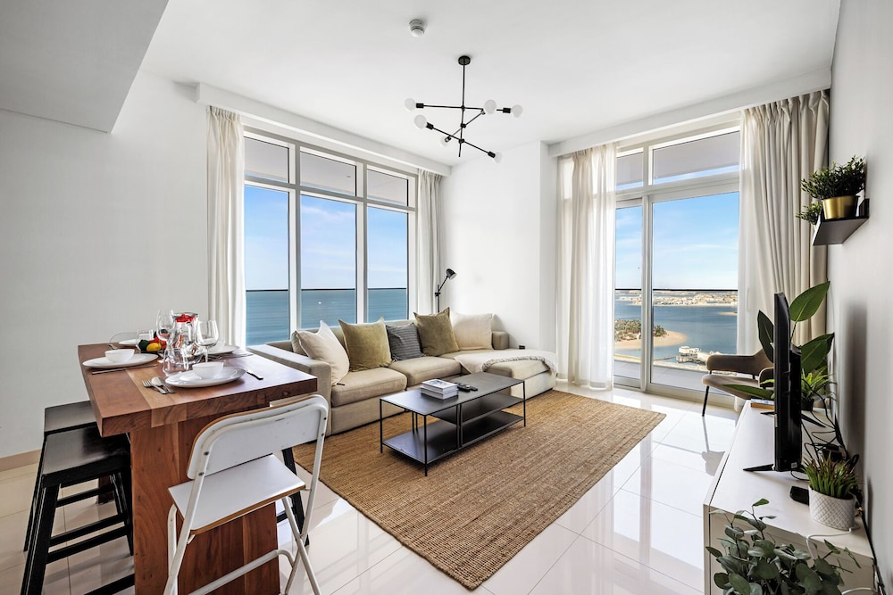 2BR Beachfront Retreat with Palm Views