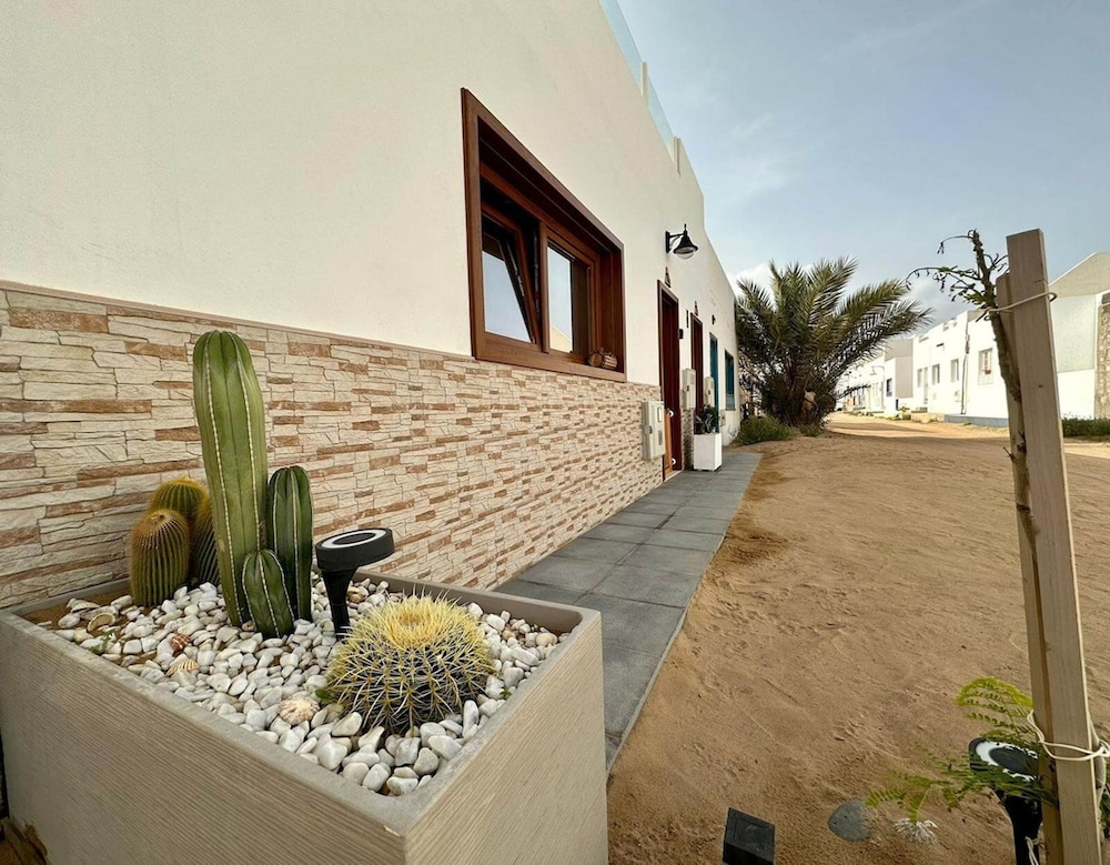 Bayside La Graciosita Traditional Home