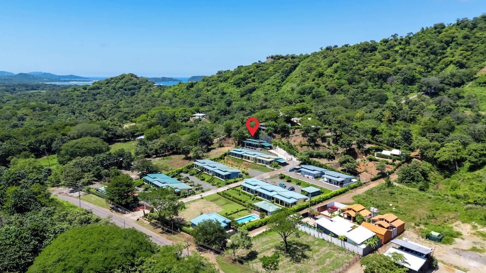 Modern Home with Lush Mountain Views and Spectacular Shaded Terrace in Private Gated Community