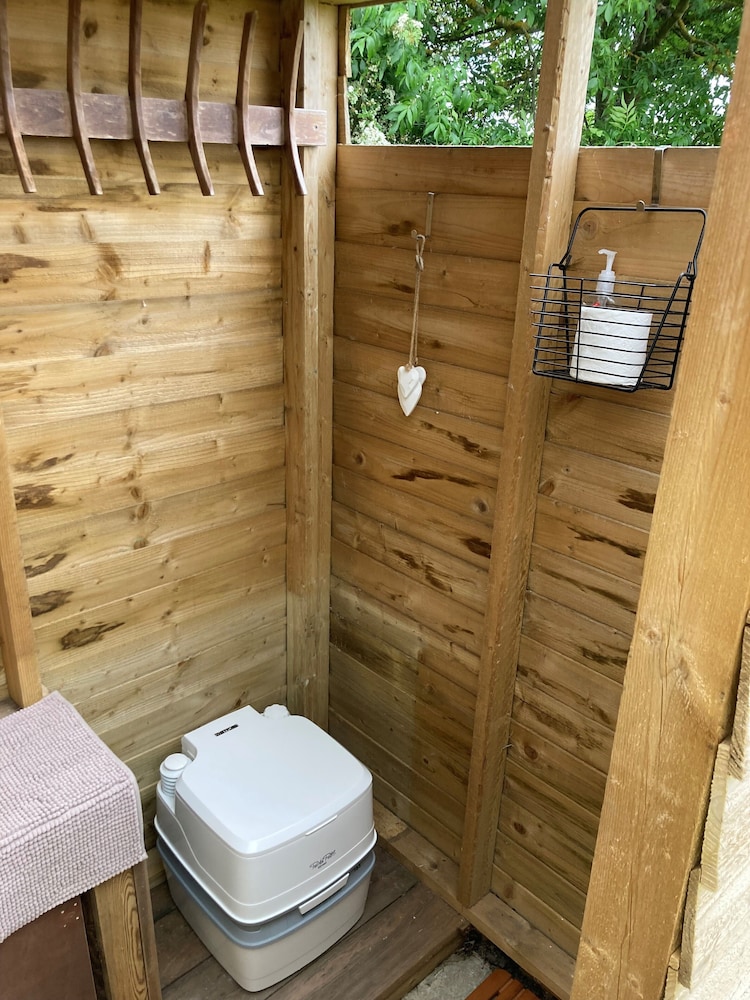 1br-sleeps2-field View-parking-cabin Experience view 4