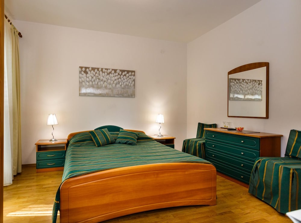 Sunny and Sleek Krk Rooms With Balcony