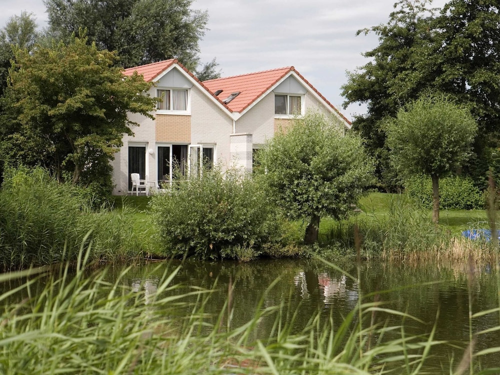Nice Holiday Home on the Water in Friesland