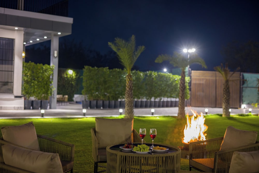 ELIVAAS Ibiza Luxe 4-BHK Farmhouse