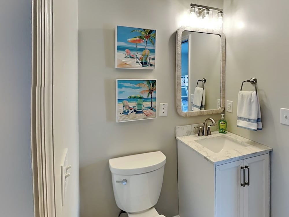 Blue Me A Wave by Topsail Realty