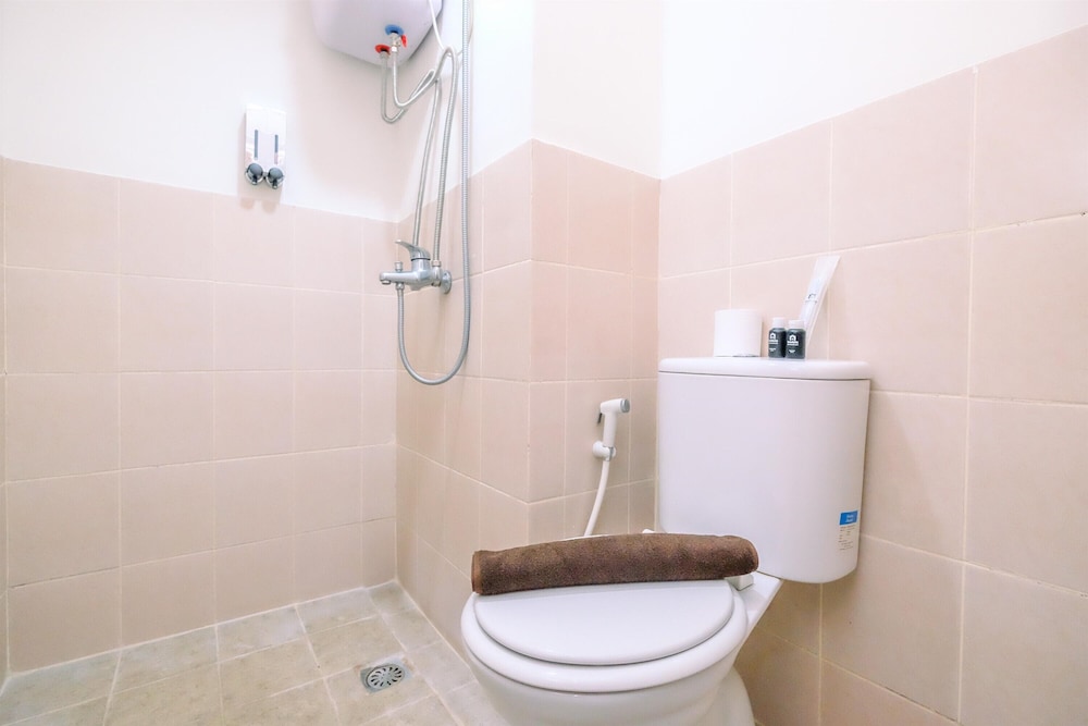 Homey and Modern 2BR at Podomoro Golf View Apartment