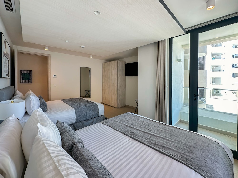 Brand-new Modern 2BR Gem on Iconic Sandy Beach