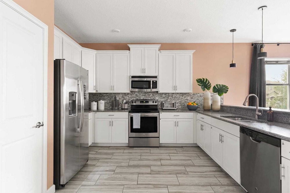 Sleeps 16! 8bdr Kid Haven w/ Pool & Arcade Orlando Resort Retreat by Avantstay