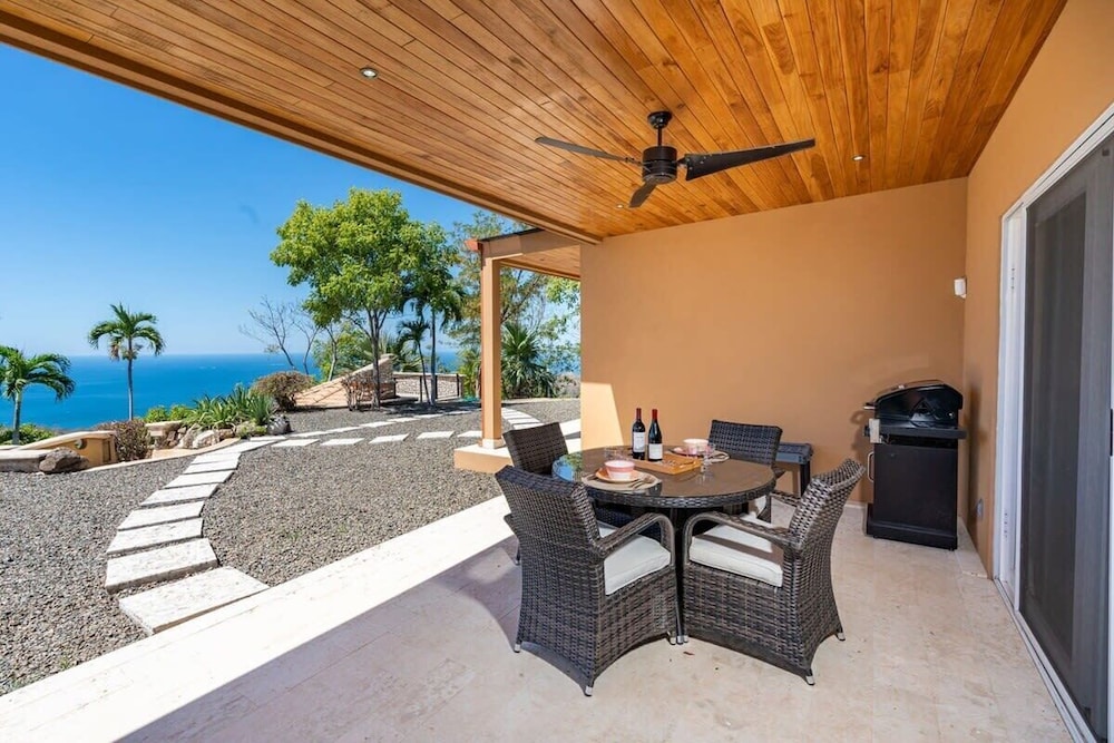 Stunning Mountaintop Property with Stylish Main Home, Private Guesthouse & Infinity Pool
