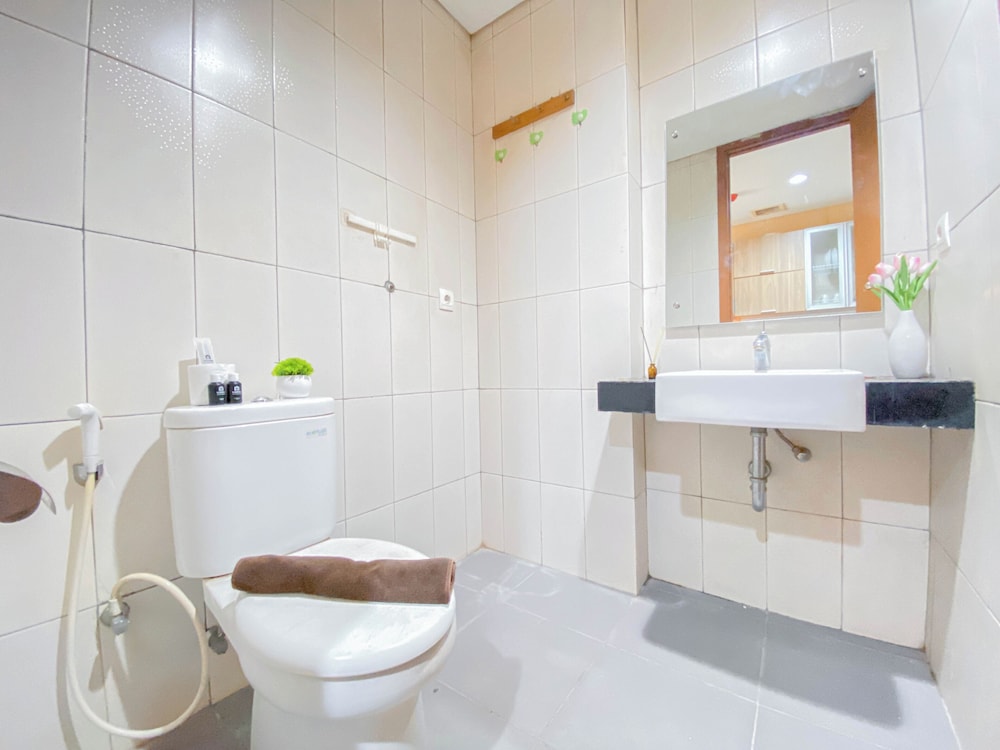 Homey and Comfortable 1BR Apartment at Dago Suites