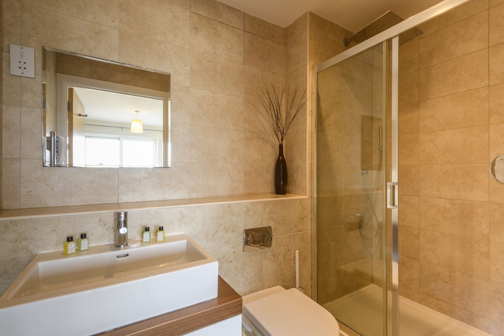 The Beach House & Porth Sands Apartments