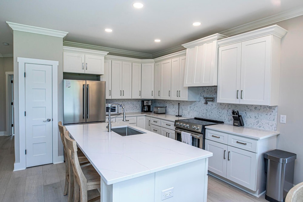 Experience Modern Coastal Living in This Beautifully Designed 4-bed, 4-bath Home