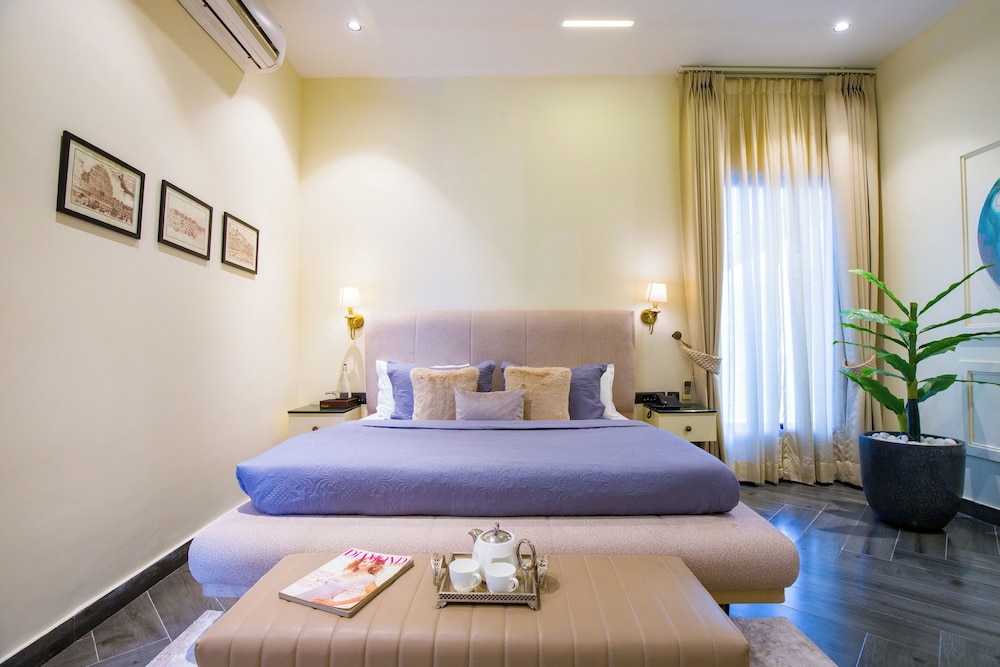 ELIVAAS Ibiza Luxe 4-BHK Farmhouse