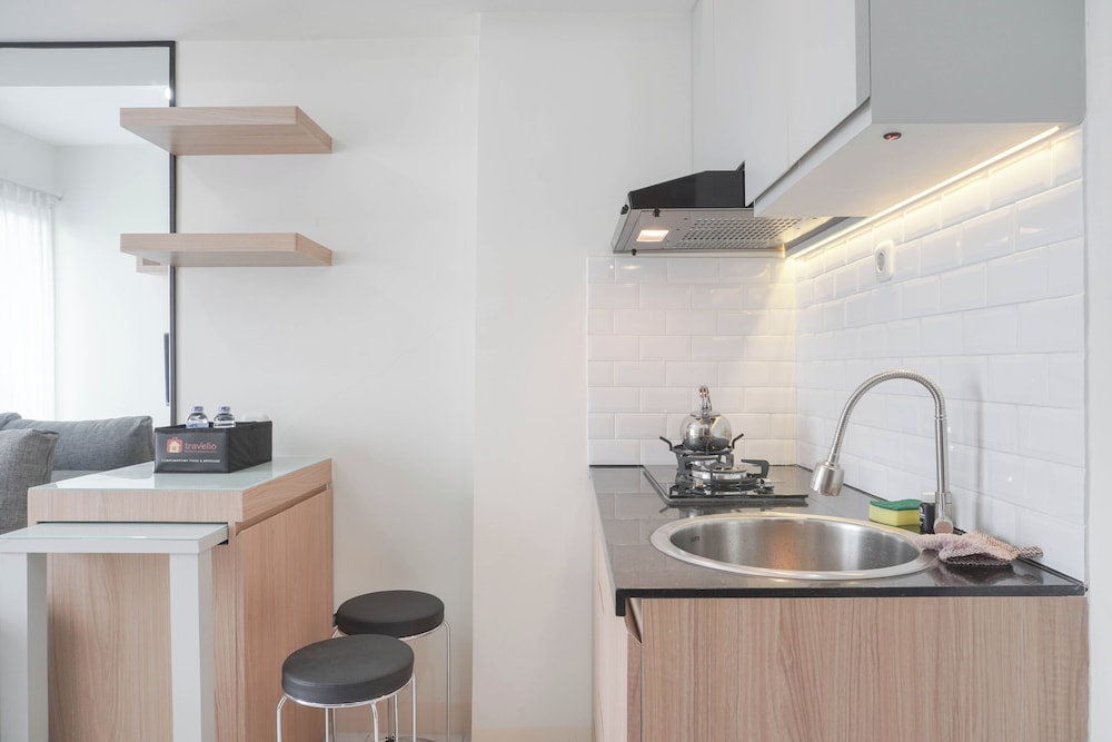 Homey and Minimalist 2BR at Podomoro Golf View Apartment