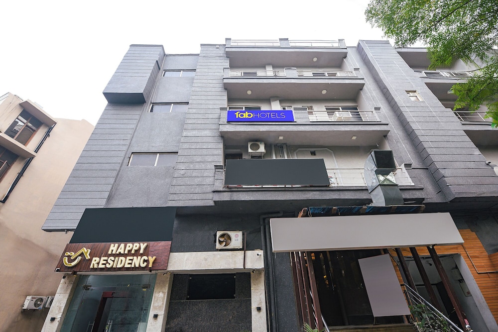 Fabhotel Happy Residency