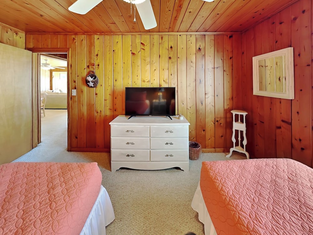A Charm of Finches by Topsail Realty