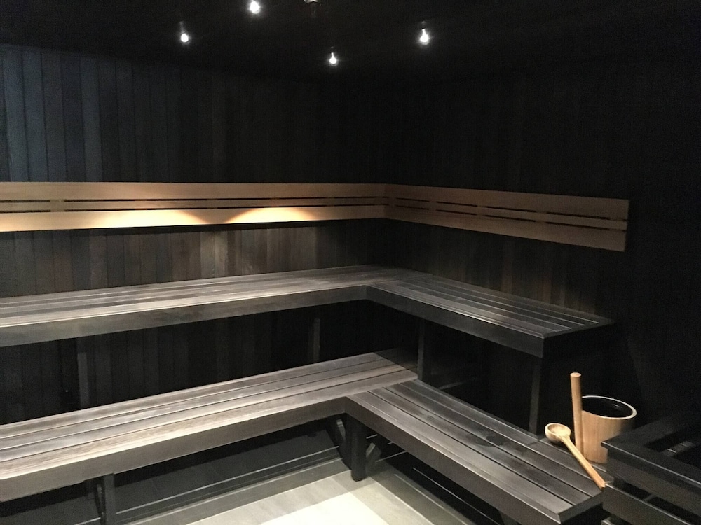 Unwind in Style at Melbourne's Historic Art Deco Apartment With Pool Gym Carpark