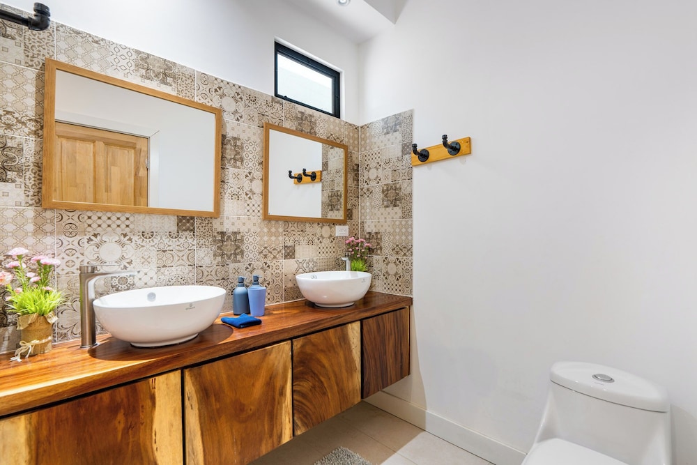 Stylish Modern Home with a Tranquil Outdoor Oasis, Spacious Open Floor Plan, and Private Swimming Pool