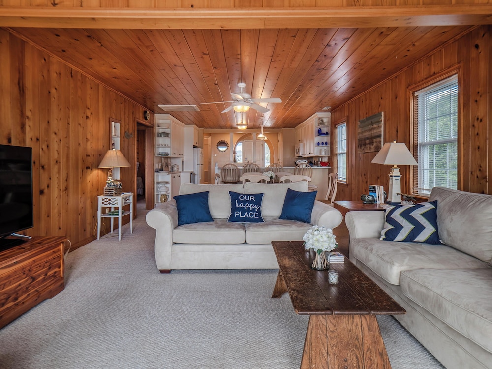 A Charm of Finches by Topsail Realty