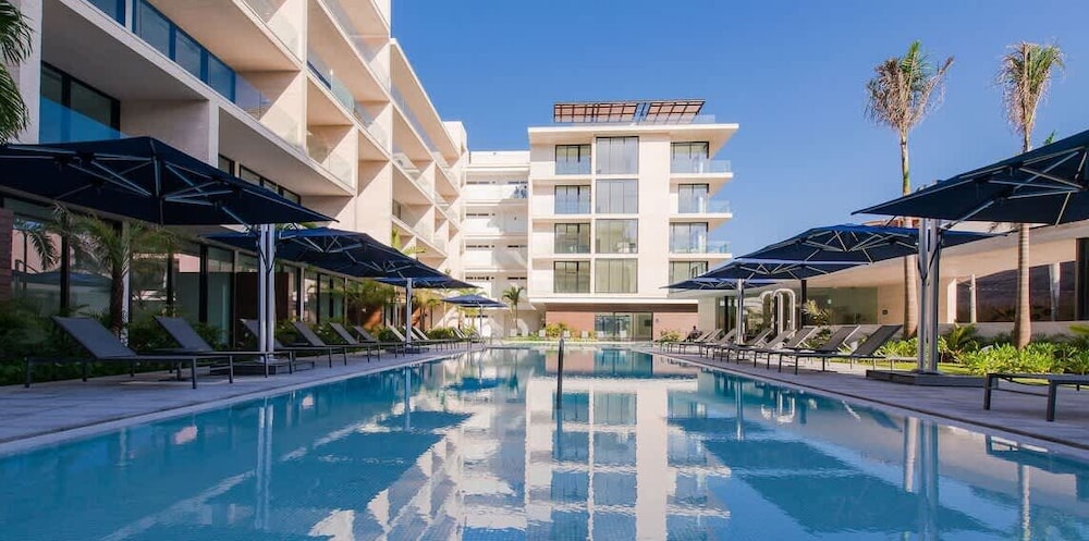 2 Br. Steps Away From the Beach Heated Pool