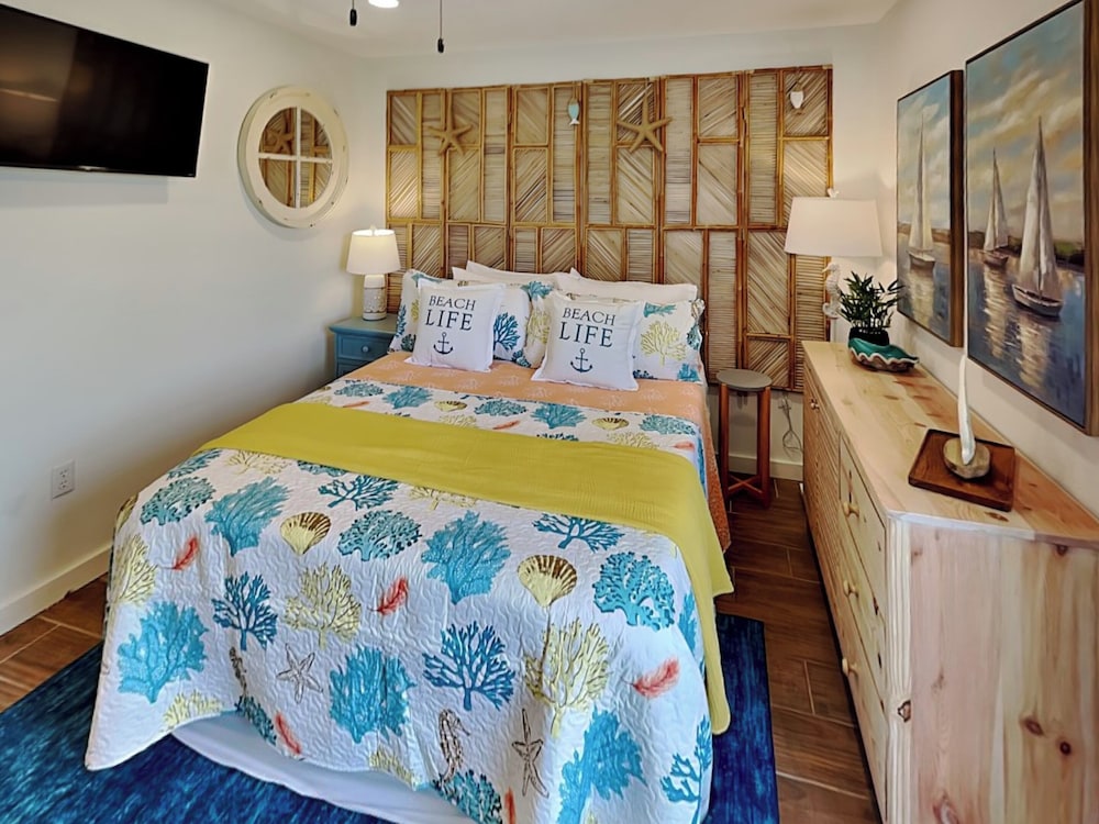 Inn at Dolphin Bay by Miss Kitty’s