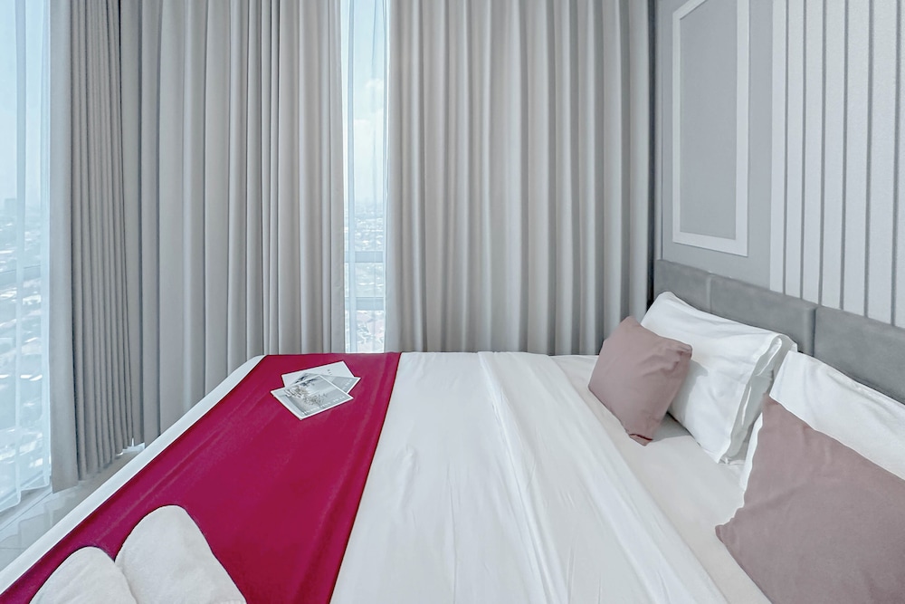 Combined Grey Toned 2Br Apartment At The City Square Surabaya