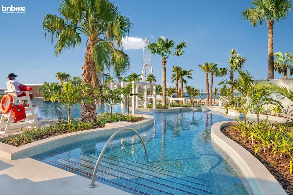 Private Beach in a Bnbme Designer Apartment