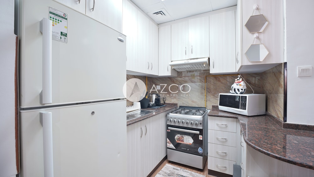 Cozy 1 BHK with City View in JVC by AZCO