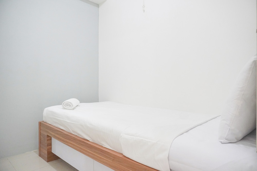 Homey And Strategic 2Br At Bassura City Apartment