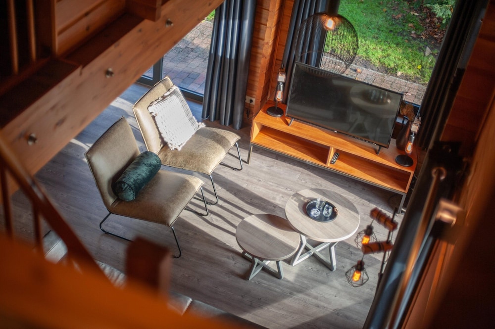 Restyled Wooden Lodge Near the Maasduinen