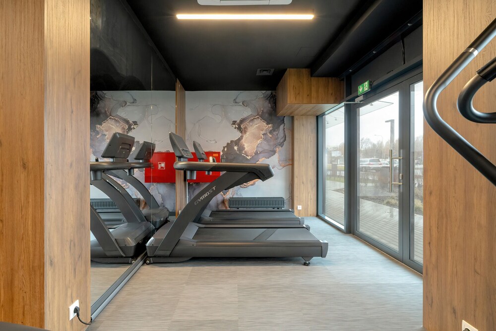 Minimalist Studios in Poznań by Renters