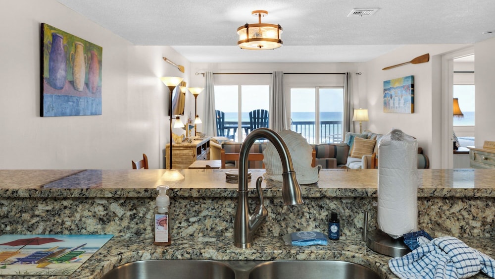 Beachfront Charm Meets Lake Life + Free Tickets: Dolphin Cruise & More!