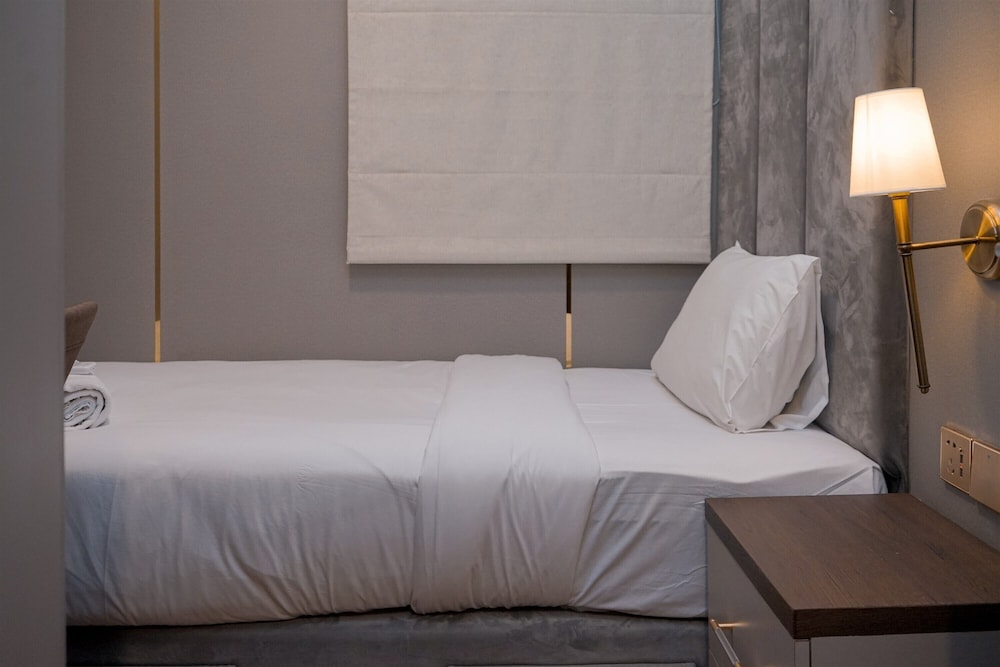 Warm Living 3BR at Sky House BSD Apartment