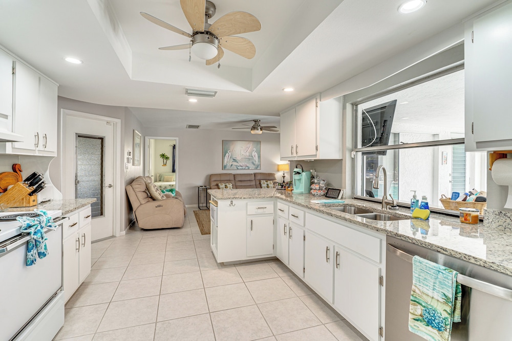 Walk to Park & Marina: Waterfront Cape Coral Home!