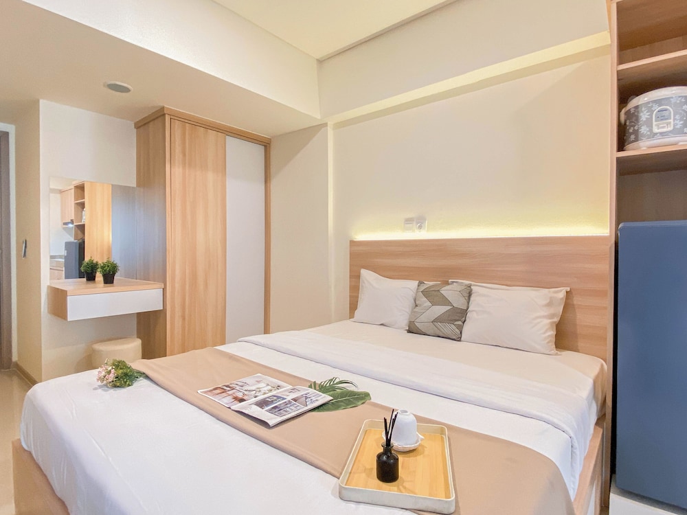 Warm Minimalist Studio Apartment Near Paramadina University At Meikarta