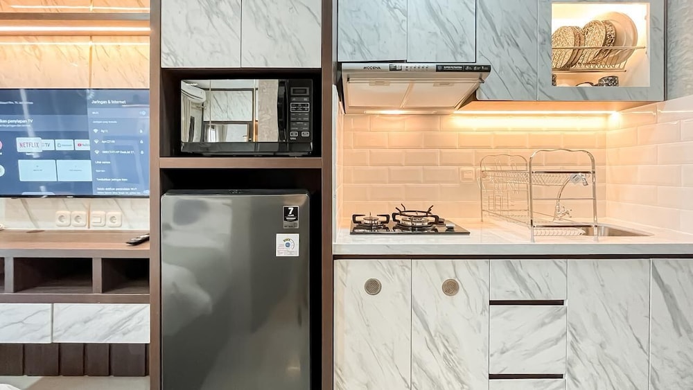 Earth Tone Studio Apartment At Transpark Bintaro