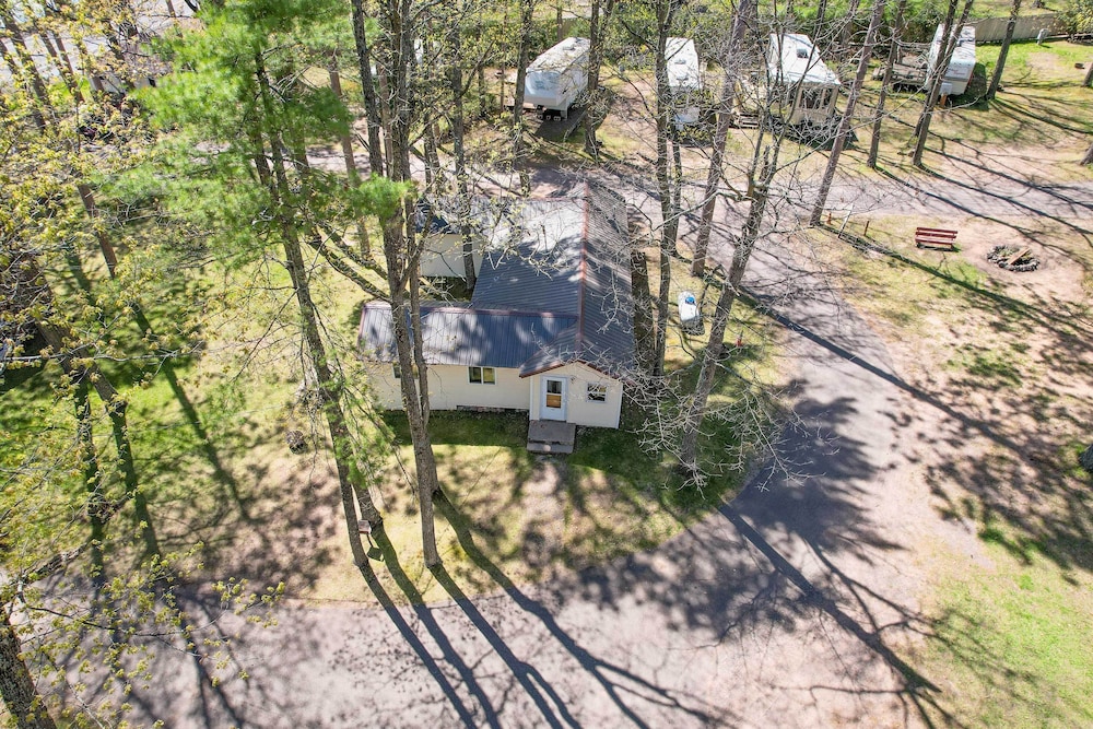 Rustic Cabin w/ Fire Pit, Steps to Sand Lake! view 3
